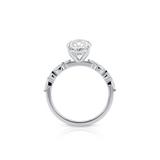 Oval Cut Engagement Ring with Marquise and Round Brilliant Diamonds